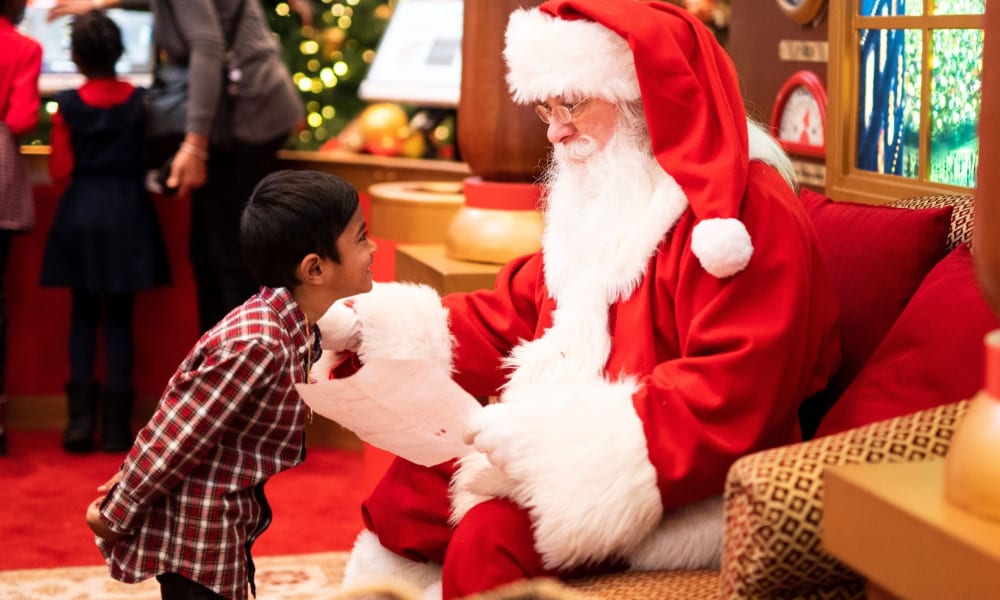 Santa talking to children