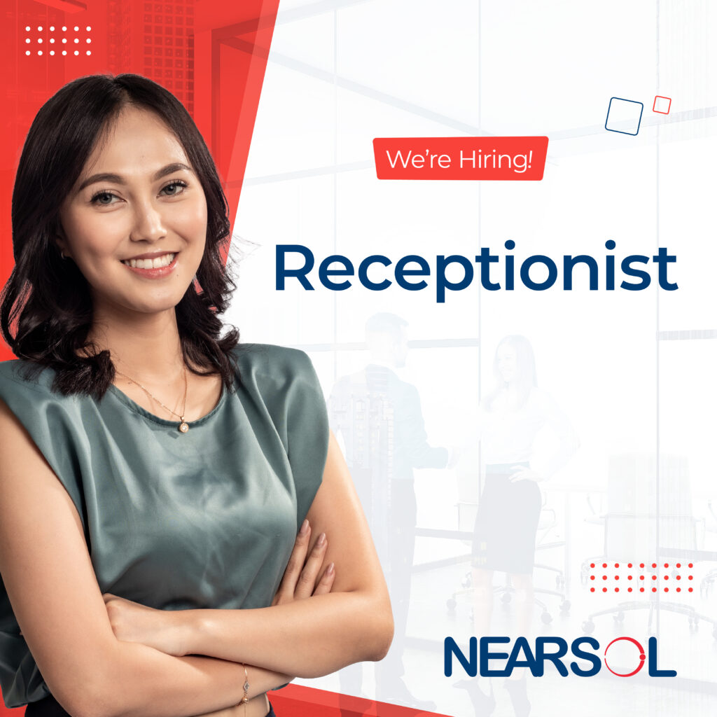 Smiling woman with crossed arms on left, text "We're Hiring! Receptionist" on right. Background shows a modern office, conveying a professional tone.